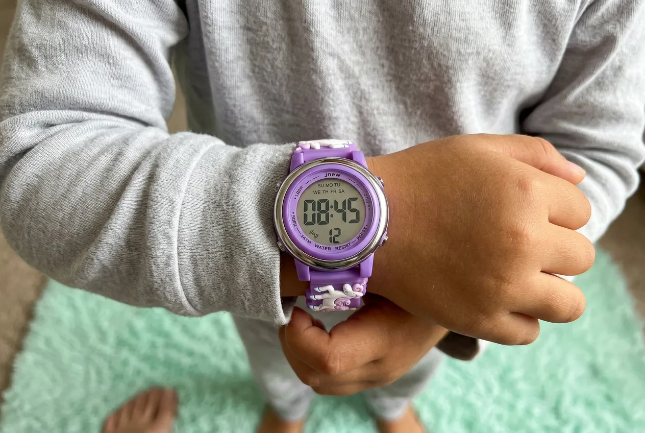Chef searing steak in stainless steel pan